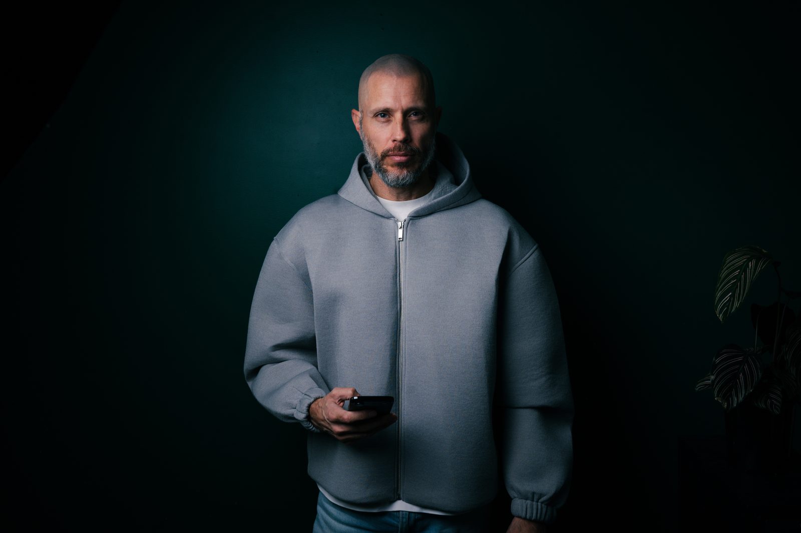 Daniel Bilsborough holding a phone