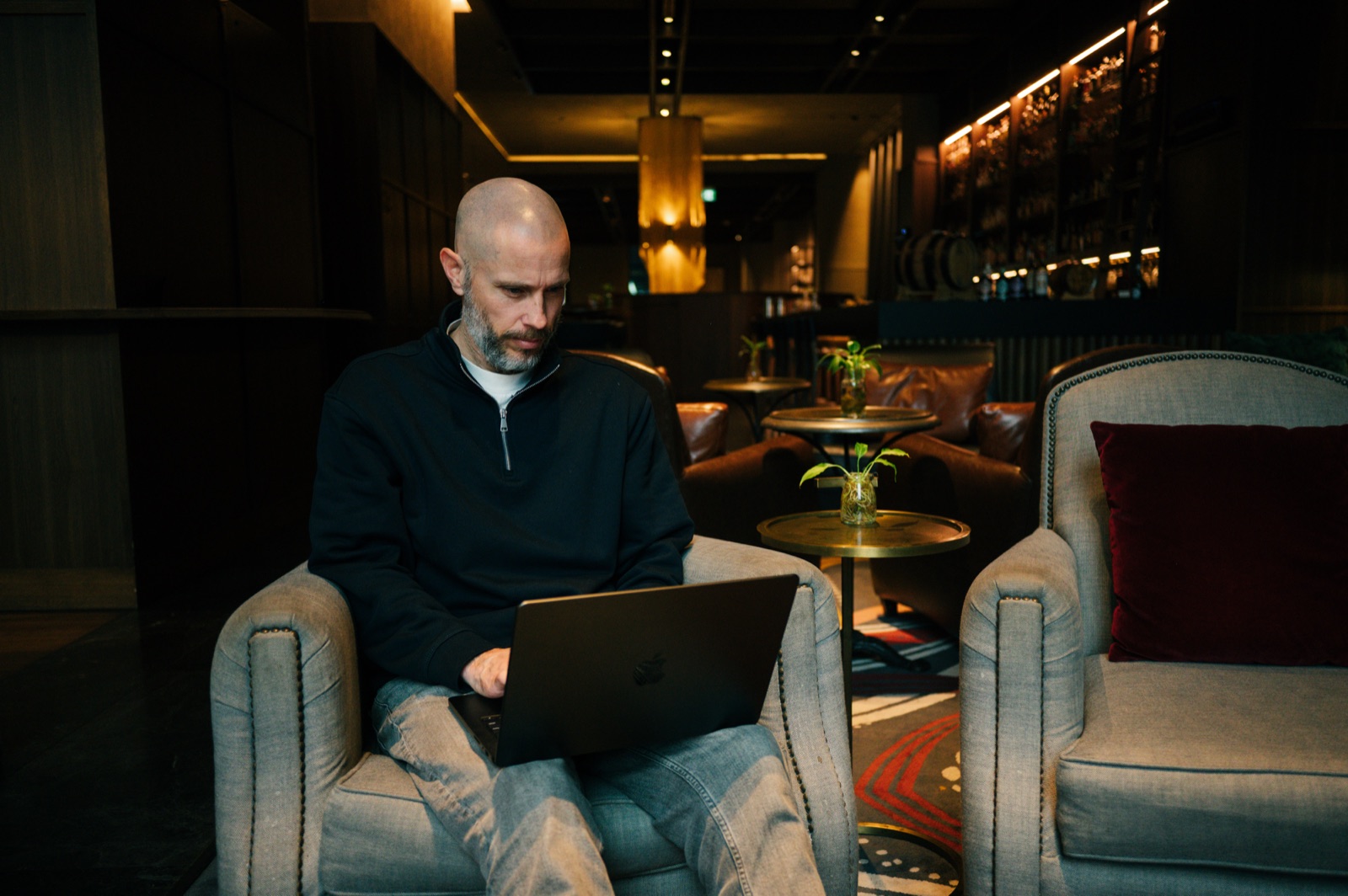 Daniel Bilsborough working with Claude Code on a laptop